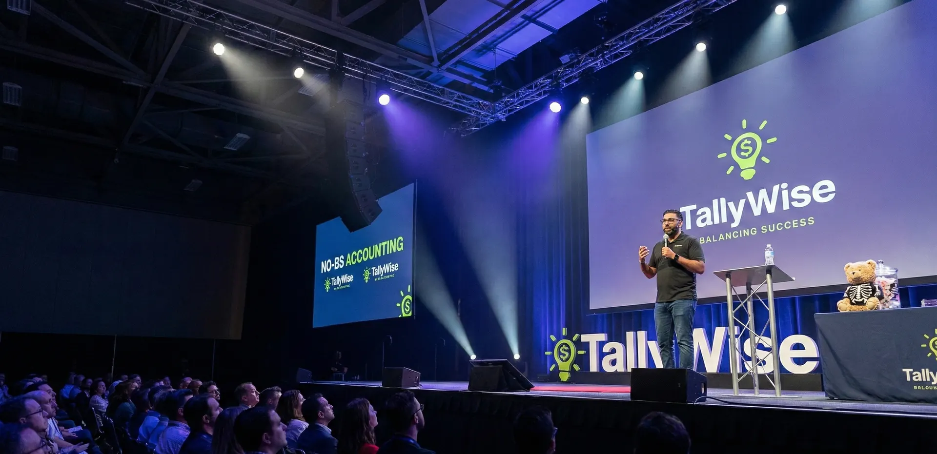 TallyWise founder presenting at a finance conference